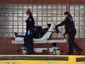 Medical staff move a patient into the  Wyckoff Heights Medical Center emergency room on April 07, 2020 in Brooklyn, New York.