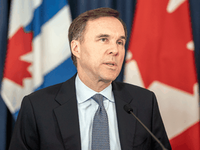 Federal Finance Minister Bill Morneau speaks at a news conference in Toronto on April 1, 2020.