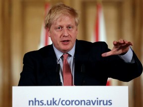 British Prime Minister Boris Johnson holds a news conference addressing the government's response to the coronavirus outbreak, at Downing Street in London, Britain March 12, 2020.