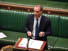 A handout photograph released by the UK Parliament shows shows Britain's Foreign Secretary Dominic Raab speaking during Prime Minister's Question time (PMQs) in the House of Commons in London on April 22, 2020.