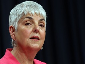 Finance Minister Carole James speaks at a press conference at the B.C. Legislature in Victoria on July 18, 2019.