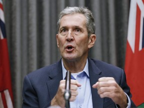 Manitoba Premier Brian Pallister speaks and answers questions during a COVID-19 press conference at the Manitoba legislature in Winnipeg Thursday, March 26, 2020.