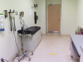A room for testing patients is shown at a COVID-19 evaluation clinic in Montreal, Tuesday, March 10, 2020. The Research Institute of the McGill University Health Center will conduct the very first Canadian test of a UV disinfection robot in the coming days.