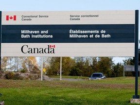 A sign for Millhaven and Bath institutions stands outside the maximum-security prison in Bath, Ont., on Saturday, September 29, 2012.