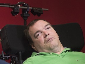Jean Truchon attends a news conference in Montreal, Thursday, September 12, 2019, where he gave his reaction to a Quebec judge overturning parts of provincial and federal laws on medically assisted dying. One of the two Quebecers who successfully fought to expand medically assisted dying has received the procedure. Jean Truchon says in a statement released posthumously that the COVID-19 pandemic forced him to push up the date he'd chosen to die.THE CANADIAN PRESS/Graham Hughes