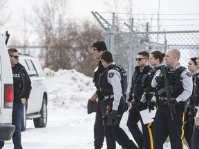 Randan Dakota Fontaine is led out of court in La Loche, Sask. on Friday, Feb.23, 2018 after a provincial court judge decided that he would be sentenced as an adult in the 2016 shooting spree that left four people dead and seven others wounded in La Loche. The Supreme Court of Canada will not hear an appeal from a young offender who was sentenced as an adult in a mass shooting at a northern Saskatchewan school.THE CANADIAN PRESS/Jason Franson
