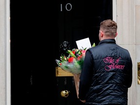 Flowers are delivered to 10 Downing Street in central London, on April 7, 2020 as Britain's Prime Minister Boris Johnson spent the nightin intensive care at St Thomas' Hospital with symptons of the novel coronavirus COVID-19.