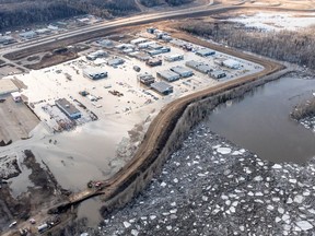 The flooded Taiga Nova Eco-Industrial Park alongside the Athabasca River at the north end of Fort McMurray is shown on Tuesday, April 28, 2020. Officials in Fort McMurray are keeping a close eye on river levels after a 25-kilometre ice jam caused major flooding and forced about 12,000 people from their homes.