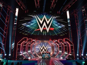 FILE PHOTO: WWE logos are shown on screens before a WWE news conference at T-Mobile Arena on October 11, 2019 in Las Vegas, Nevada.