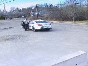 This photo showing the gunman changing clothes beside a replica RCMP vehicle was released as the Nova Scotia RCMP provided an update on Tuesday, April 28, 2020 into their investigation into the killing of 22 people. THE CANADIAN PRESS/HO-Nova Scotia RCMP MANDATORY CREDIT
