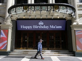 An electronic sign above the entrance to the London Palladium theatre, closed-down due to COVID-19, reads "Happy Birthday Ma'am", a birthday wish for Britain's Queen Elizabeth II, in London on April 21, 2020.