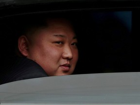 North Korea's leader Kim Jong Un sits in his vehicle after arriving at a railway station in Dong Dang, Vietnam, at the border with China, Feb. 26, 2019.