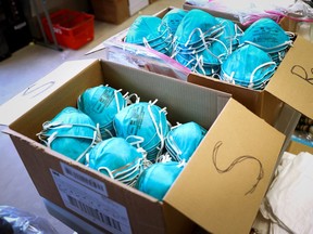 Boxes of N95 protective masks for use by medical field personnel are seen at a New York State emergency operations incident command centre during the coronavirus outbreak in New Rochelle, New York, U.S., March 17, 2020.