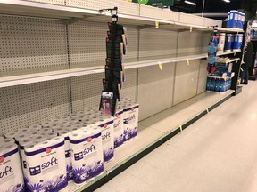 Near empty toilet paper shelves are pictured at a grocery store in North Vancouver, B.C. on March 14, 2020. The Forest Products Association of Canada says the demand for toilet paper has skyrocketed during the COVID-19 pandemic. Association president Derek Nighbor says demand has shot up by 241 per cent.