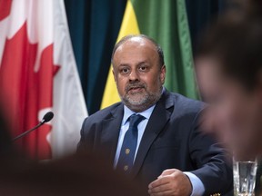 Saqib Shahab, chief medical health officer, speaks at a COVID-19 news update at the Legislative Building in Regina on March 18, 2020. Saskatchewan's chief medical health officer says any plan to relax some of the restrictions on public interaction in place to prevent the spread of COVID-19 would have to be looked at week by week.
