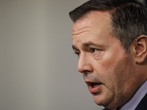 Alberta Premier Jason Kenney updates media on measures taken to help with COVID-19, in Edmonton on Friday, March 20, 2020.