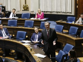Manitoba Premier Brian Pallister speaks at an emergency COVID-19 physically distanced session at the Manitoba Legislature in Winnipeg, Wednesday, April 15, 2020. Pallister says there is room in the public sector for temporary reduced work weeks that will save the government money during the COVID-19 pandemic.THE CANADIAN PRESS/John Woods
