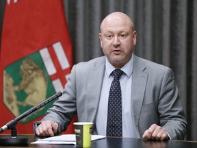 Dr. Brent Roussin, Manitoba chief public health officer, speaks during the province's latest COVID-19 update at the Manitoba legislature in Winnipeg Tuesday, March 31, 2020.