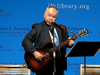 John Prine performs at the John F. Kennedy Library in Boston, Sept. 19, 2016.