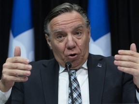 Quebec Premier Francois Legault speaks to reporters during a news conference on the COVID-19 pandemic, Friday, April 24, 2020 at the legislature in Quebec City.