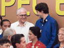 Prime Minister Justin Trudeau speaks with Australian Prime Minister Malcolm Turnbull as leaders take their place for an official photograph at the APEC Summit in Danang, Vietnam, Nov. 10, 2017.