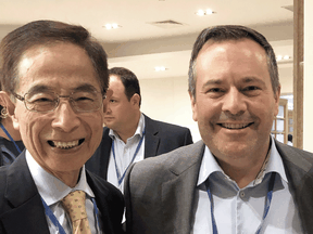 Hong Kong Democratic Party founder Martin Lee with Alberta Premier Jason Kenney.