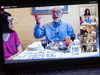 Rabbi Jeffrey Bennett of Temple Sinai in Newington, Connecticut, hosts a virtual community seder on Zoom during the first night of Passover, as seen on a laptop computer, April 8, 2020.