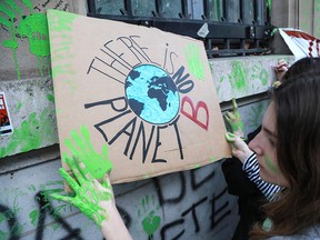 High school and college students demonstrate against climate change near the French Ministry for Ecology in Paris on Feb. 15, 2019.