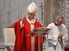 Pope Francis blesses attendees at the end of Palm Sunday mass behind closed doors at St. Peter’s Basilica on April 5, 2020 in The Vatican, during q lockdown aimed at curbing the spread of COVID-19.