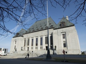 The Supreme Court of Canada is seen Friday, April 25, 2014 in Ottawa. The Supreme Court of Canada will not look at whether Quebec's secularism law should be suspended while a full legal challenge of the measure plays out.