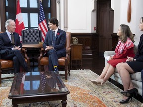 Canada's Minister of Foreign Affairs Chrystia Freeland, second from right, and Acting Ambassador of Canada to the United States of America Kirsten Hillman, right, look on as Prime Minister Justin Trudeau speaks with Richard Neal, Chairman of the Committee on Ways and Means of the United States House of Representatives on Parliament Hill in Ottawa, Wednesday November 6, 2019. Hillman says the links the two countries forged during the 2018 talks to replace the North American Free Trade Agreement have been key to the successful shared effort to manage the COVID-19 crisis.THE CANADIAN PRESS/Adrian Wyld