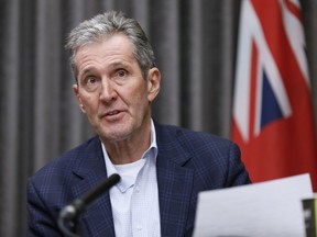 Manitoba Premier Brian Pallister speaks during the province's latest COVID-19 update at the Manitoba legislature in Winnipeg Monday, March 30, 2020. The Manitoba government says it will now test anyone with COVID-19 symptoms to see if they have the novel coronavirus.