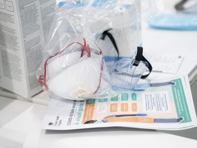 In this Thursday, April 16, 2020 photo, a view of masks and goggles, part of PPE, personal protective equipment, to avoid being infected or transmitting coronavirus, at the Nightingale Hospital North West set up in the Manchester Central Convention Complex in Manchester, northern England. Some primary-care doctors say they still have no line of sight on when they will get much needed protective equipment, and they are starting to run critically low on supplies.THE CANADIAN PRESS/AP/Jon Super