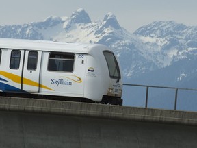 A Skytrain is pictured in Burnaby, B.C. Tuesday, April 14, 2020. There have been significant layoffs of bus drivers and deep service cuts on buses, SeaBus, SkyTrain and West Coast Express across Metro Vancouver.