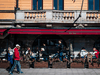 People enjoy the spring weather as they sit at a restaurant in Stockholm on April 15, 2020, during the coronavirus COVID-19 pandemic.