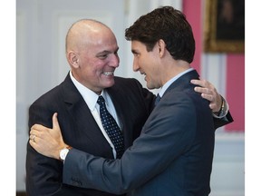 Prime Minister Justin Trudeau embraces Dominic LeBlanc as he's sworn in as president of the Queen's Privy Council for Canada. LeBlanc has suggested the federal government clamp down on misinformation. He should start with his own government, says columnist Danielle Smith.