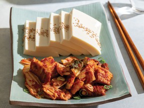 Warm tofu with kimchi and pork belly stir-fry