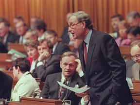 Prime Minister Jean Chretien watches while Finance minister Paul Martin defends his budget in the House of Commons in 1995.