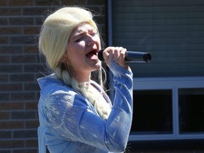 Local performer Kassie Taylor (Kassandra Bazinet) performs a song from Disney's Frozen for residents and employees at Chartwell Westmount on William Retirement Residence in Sudbury, Ont. on Friday May 1, 2020.