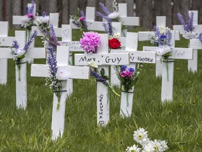 Crosses commemorate 50 people who died of COVID-19 at the Camilla Care Community long-term care facility in Mississauga, Ont.