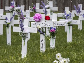 Crosses commemorate the 50 people who have died of COVID-19 at the Camilla Care Community long-term care facility, in Mississauga, Ont.