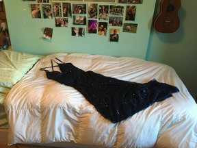 Bridget Wadden's prom dress, which will no longer have its day at prom, lies on her bed. Many high school students are grappling with the loss of end-of-year events — and the closure they symbolize — which have been cancelled due to COVID-19.