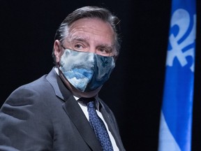 Quebec Premier Francois Legault leaves a news conference in Montreal, on Monday, May 25, 2020.