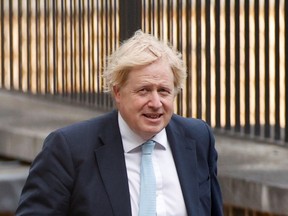 Britain's Prime Minister Boris Johnson arrives at Downing Street, following the outbreak of the coronavirus disease (COVID-19), in London, Britain, May 4, 2020.