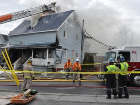 A fire tore through a blue McConnell Avenue triplex on Wednesday April 29, 2020 in Cornwall, Ont.