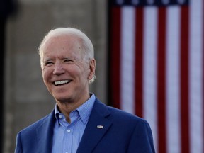 In this March 7, 2020, file photo Democratic presidential candidate former Vice President Joe Biden acknowledges the crowd during a campaign rally in Kansas City, Mo.