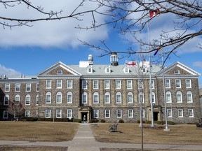 A man walks across the Dalhousie University campus in Halifax on Monday, March 16, 2020.