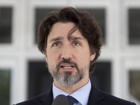 Prime Minister Justin Trudeau responds to a question from the media during a daily news conference outside Rideau Cottage in Ottawa, Friday May 22, 2020.