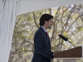 Prime Minister Justin Trudeau speaks during a daily briefing on COVID-19 outside Rideau Cottage in Ottawa, Thursday, May 14, 2020.