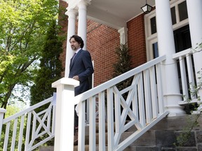 Prime Minister Justin Trudeau steps out of Rideau Cottage for a news conference in Ottawa, Wednesday May 27, 2020.
